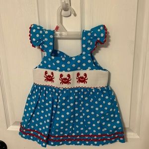 A smocked auctions two piece set